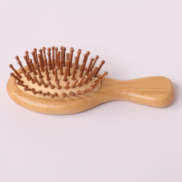 Wooden paddle brush